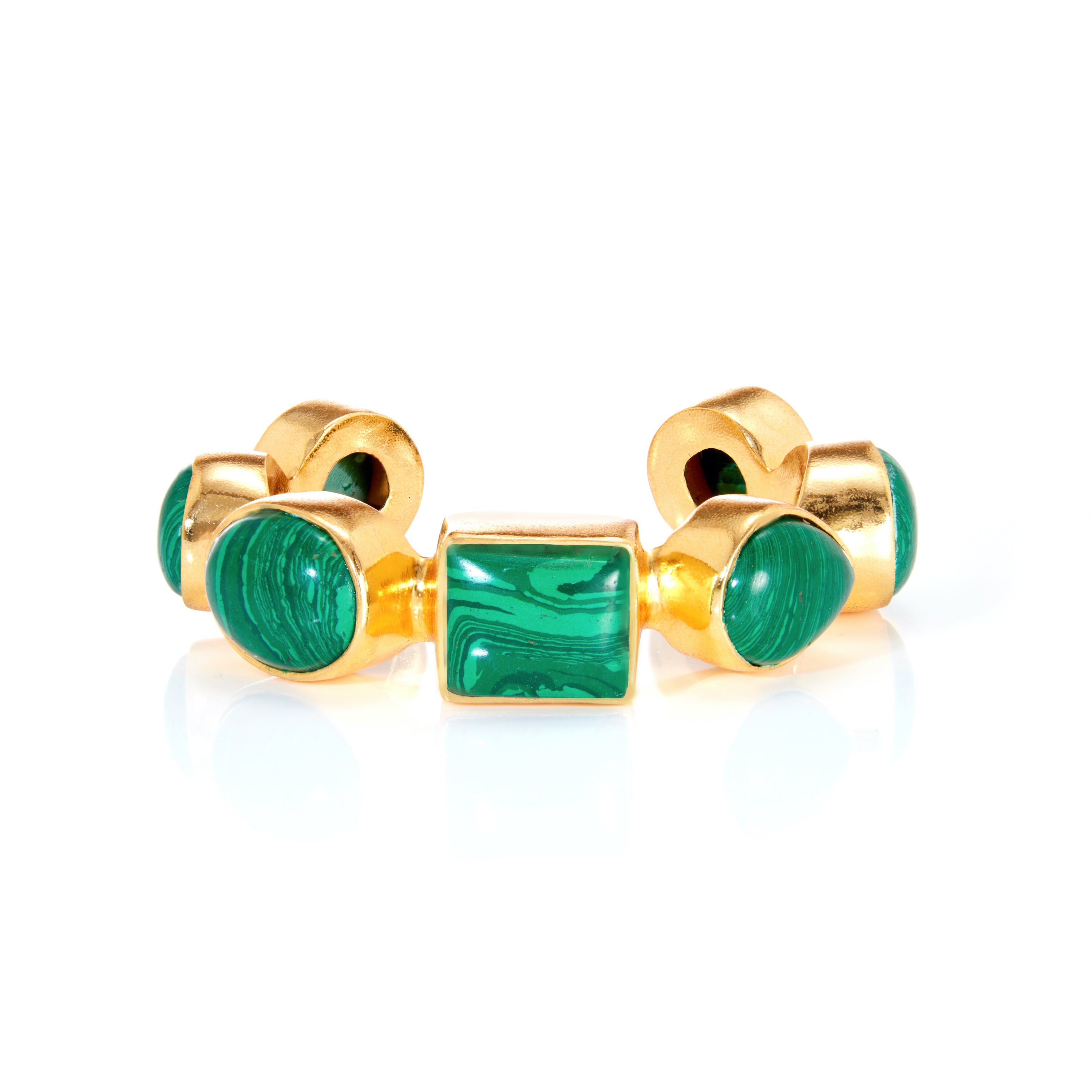 Gold ring with green gemstone center and round side stones