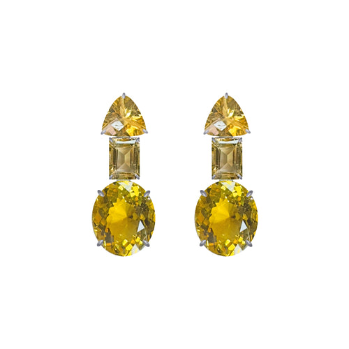 Pair of yellow gemstone earrings on a white background