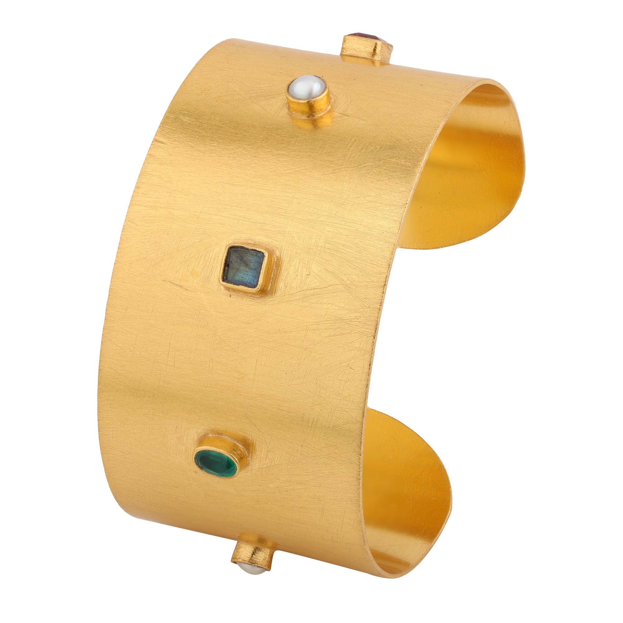Wide gold cuff bracelet with gemstone stud accents