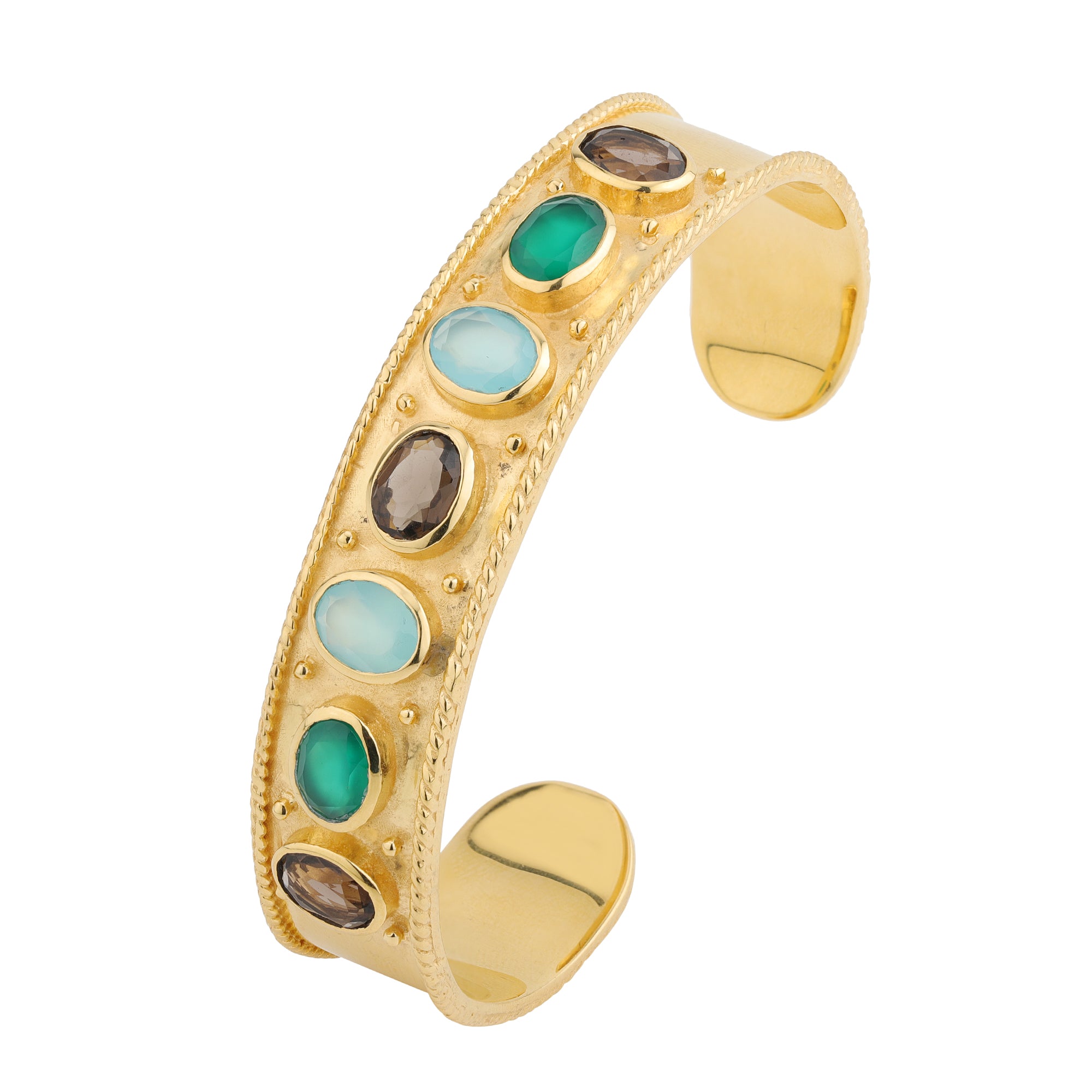 Gold cuff bracelet with alternating green, blue and dark gemstone inlays