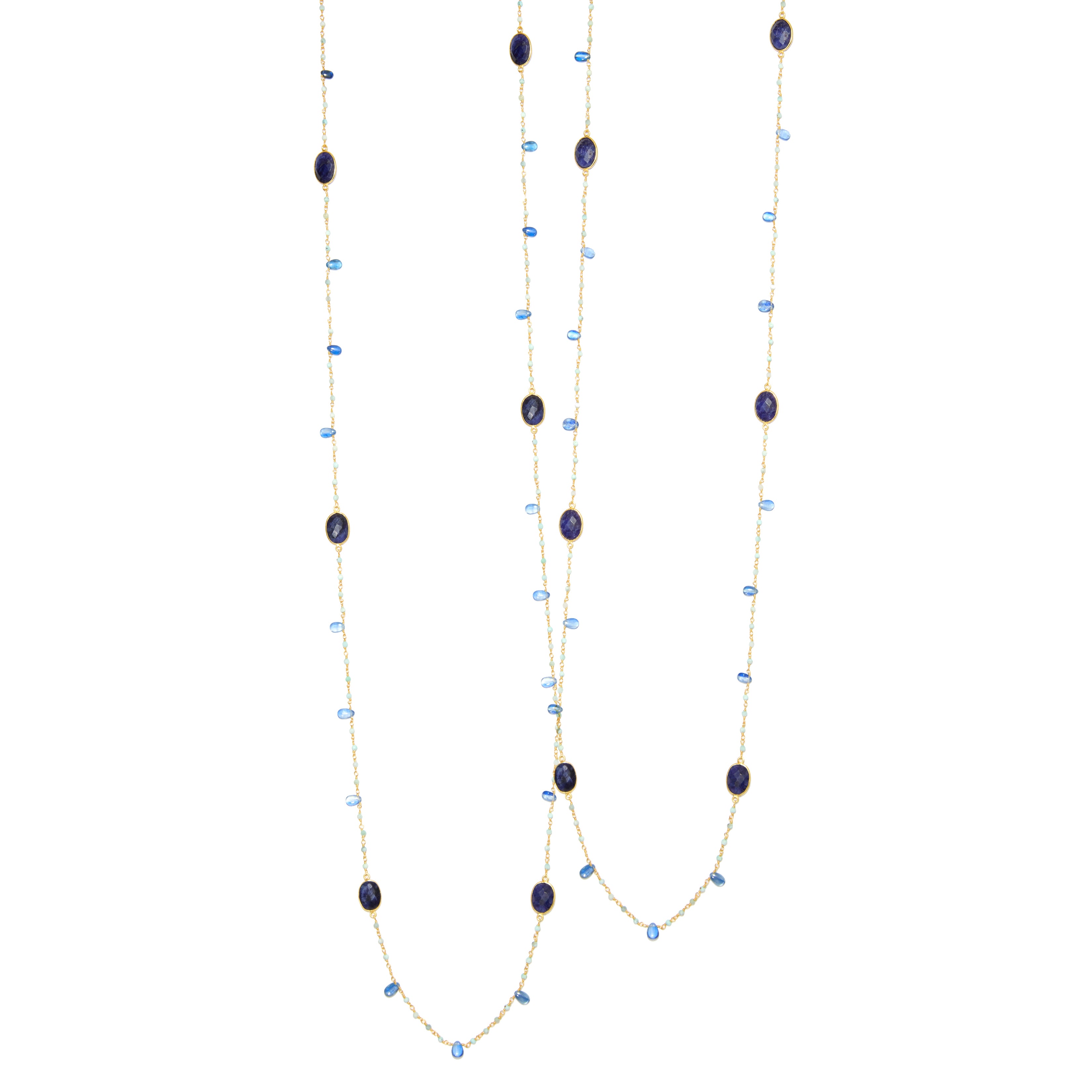 A sterling silver necklace with a layered design featuring bezel set sapphire, kyanite, and larimar studs, adorned with small blue and green stones.